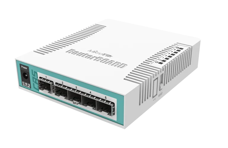MikroTik RouterBOARD network router/switch with five Ethernet ports labeled 1–5 and an SFP slot on a white metal enclosure